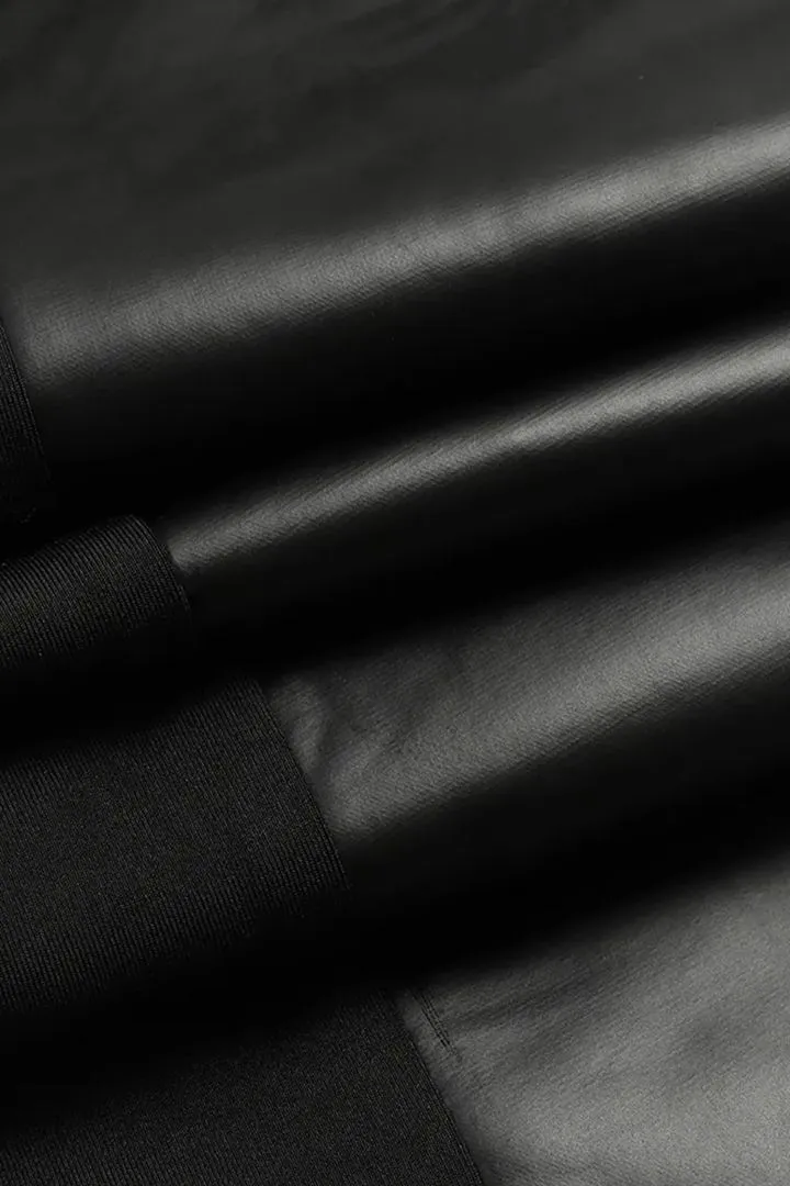 Pantalón efecto piel con vivos en contraste y cremallera-ES