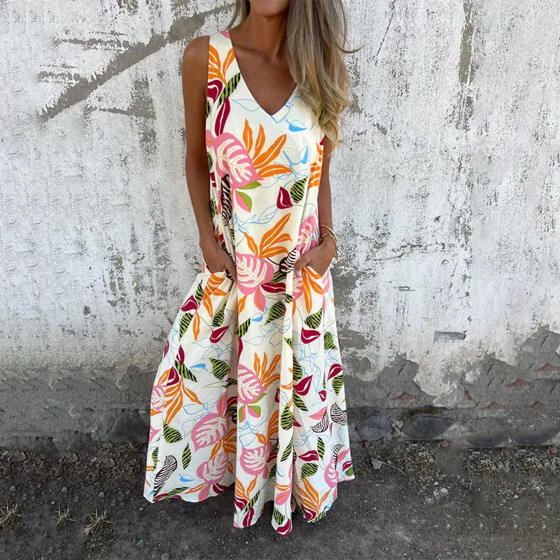 Vestido moderno sin tirantes, escote en V y bolsillos-ES