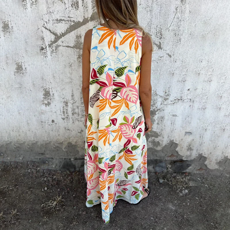 Vestido moderno sin tirantes, escote en V y bolsillos-ES