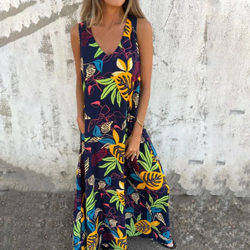 Vestido moderno sin tirantes, escote en V y bolsillos-ES