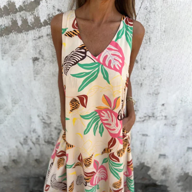 Vestido moderno sin tirantes, escote en V y bolsillos-ES